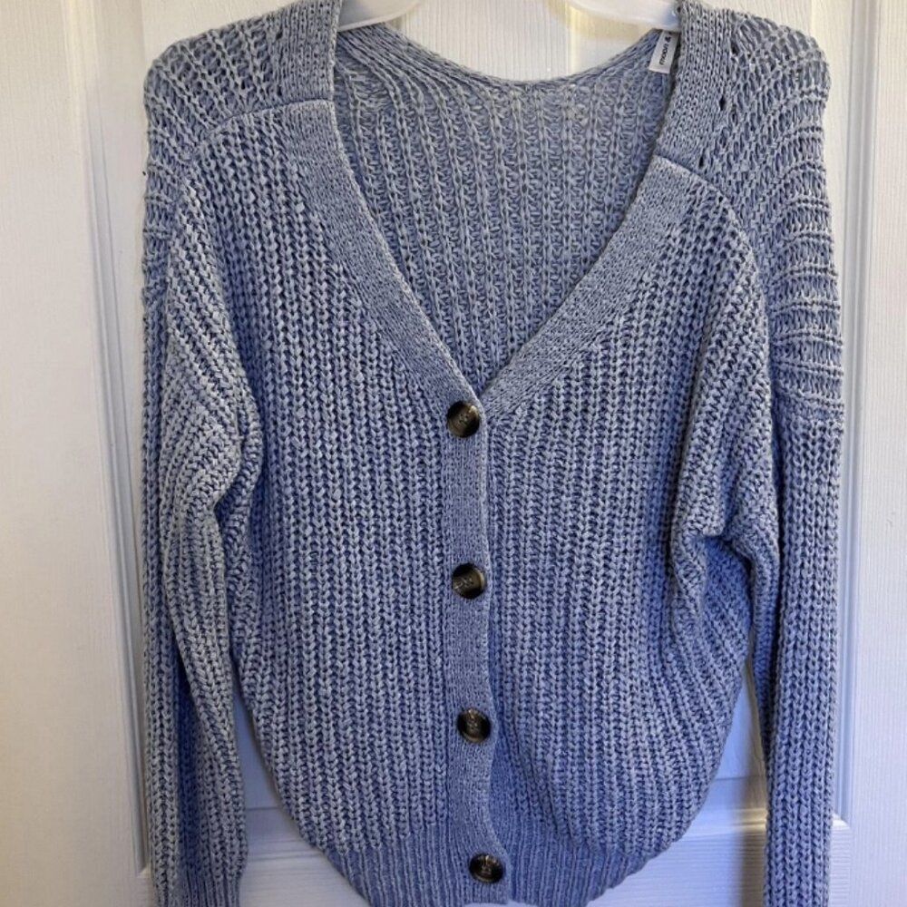 Small light blue cardigan with tortoiseshell buttons